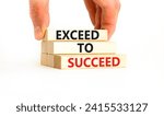 Small photo of Exceed to succeed symbol. Concept words Exceed to succeed on beautiful wooden blocks. Beautiful white table white background. Businessman hand. Business and exceed to succeed concept. Copy space.