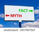 Small photo of Fact or myth symbol. Concept word Myth and Fact on beautiful billboard with two arrows. Beautiful blue sky with clouds background. Business and fact or myth concept. Copy space.