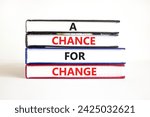 Small photo of A chance for change symbol. Concept words A chance for change on beautiful books. Beautiful white table white background. Business A chance for change concept. Copy space.