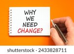Small photo of Why we need change symbol. Concept words Why we need change on beautiful white note. Beautiful orange background. Voter hand. Business and why we need change concept. Copy space.