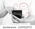 Small photo of Woman holding phone for responding to negative comments. Black and white. Dissatisfaction, negative client experience. Bad feedback on social media. High quality photo