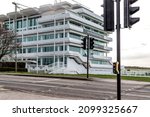 Small photo of Epsom Downs, UK - February 21, 2020 - A pelican crossing for horses and riders stands before the Queens Stand and Lester Piggott Gates at Epsom Downs racecourse, Surrey, England.