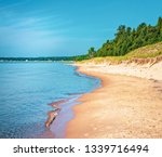 Sandy Beach coastline of Lake Michigan from Whitefish Dunes State Park in Door County Wisconsin.