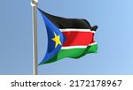 south sudanese flag on flagpole.... | Shutterstock . vector #2172178967