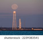 A northrop grumman antares rocket carrying a Cygnus resupply spacecraft during sunrise, soon launching. Digitally enhanced. Elements of this image furnished by NASA.  