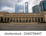 Small photo of Nashville, Tennessee USA - 11 30 2021: the Nashville Symphony Schermerhorn Symphony Center and the The Pinnacle at Symphony Place with powerful clouds at sunset in Nashville Tennessee USA