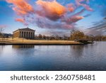 Small photo of a gorgeous autumn landscape at Centennial Park with a still lake surrounded by autumn colored trees reflecting off the water and powerful clouds at sunset in Nashville Tennessee USA