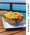 Delicious fruit bowl at Rick’s Cafe, Jamaica with beautiful ocean view