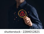 Small photo of Man with magnifying glass and warning icon, symbolizing caution and scrutiny. Perfect for graphics, illustrations, and web design projects. Stock photo.
