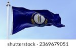 The US state flag of Kentucky waving. Kentucky flag features state seal: two men embracing, motto United We Stand, Divided We Fall above. 3d illustration render. Fluttering fabric