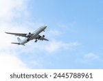 White passenger airplane flying ...
