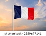 France flag waving on sundown...