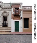 Small photo of BUENOS AIRES, ARGENTINA - Jan 2nd, 2020: Casa Minima facade, the tightest house of the city located at San Lorenzon street in San Telmo, Buenos Aires