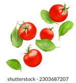 Small photo of levitating cherry tomatoes and basil leaves on a white isolated background