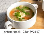 Small photo of Soup in soup bowl. Portion of fresh soup in serving tureen .