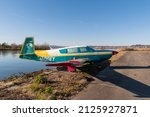 Small photo of Wangen-Lachen, Switzerland, February 13, 2022 Mooney M20 propeller plane is exhibited on a small airfield