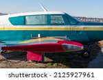 Small photo of Wangen-Lachen, Switzerland, February 13, 2022 Mooney M20 propeller plane is exhibited on a small airfield