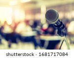 Small photo of Microphone voice speaker in business seminar, speech presentation, town hall meeting, lecture hall or conference room in corporate or community event for host or townhall public hearing