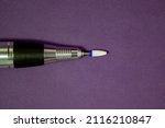 Small photo of Frazier for French Manicure and Pedicure on a Purple Background. Specialized Equipment for Masters of Nail Service. Business and Beauty concept.