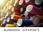 Small photo of Rolls of vinyl self-adhesive film are on the shelf in the store. Sale of film for pasting cars. Production of vinyl film for tuning.