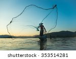 Fisherman Casting His Net At...