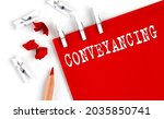 Small photo of CONVEYANCING text on red paper with office tools on white background