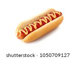 Hot dog with ketchup and...