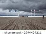 Small photo of Sopot,Poland- may 21,2022:streets and buildings of the city of Sopot on a cloudy rainy day before the beginning of the tourist season, Sopot molo.pier