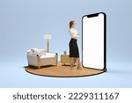 Small photo of New opportunities, modern lifestyle. Young girl standing in front of huge 3d model of cellphone with blank white screen and thinking isolated on blue background. Online working, payment, new app
