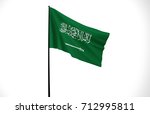 saudi arabia flag  wavy fabric... | Shutterstock . vector #712995811