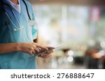 Healthcare And Medicine. Doctor using a digital tablet
