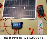 Arduino project powered through energy from small solar panels. Voltmeter uses for mesuring voltage from little photovoltaic panel. Charge  regulator, battery, tester, Led, insulating tape.