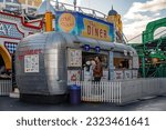 Small photo of St Kilda, Victoria, Australia - March 24, 2023: Retro diner at Luna Park, the popular century-old amusement park in Melbourne's bayside suburb of St Kilda.
