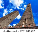 Small photo of Bologna, Italy - 08 18 2022: Torre degli asinelli and Torre Garisenda, the two symbolic towers of the city of Bologna that stand out against the blue sky.