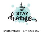 stay home lettering with a cup... | Shutterstock .eps vector #1744231157