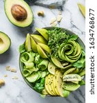 fresh summer salad with avocado ... | Shutterstock . vector #1634768677