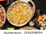 four cheese pizza quattro... | Shutterstock . vector #1956598954