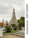 Small photo of Wat Arun or Wat Arun Ratchawararam is an important temple in Bangkok. Located by the Chao Phraya River Nearby there is a pier that can travel to Wat Pho.