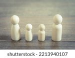 Image of a family (peg doll)
