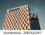 Small photo of Helsinki, Finland - 11.10.2021: Clarion Hotel Jatkasaari with swimming pool on roof top. Modern urban Nordic architecture. Contemporary Scandinavian building against sky. Business Corporate office