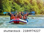 Cheerful Team Is Rafting On A...