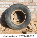 An Old And Used Up Truck Tire...