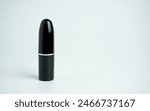 Closed black lipstick with lid...