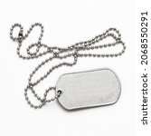 Small photo of American military dog tags. badge with the name of a soldier