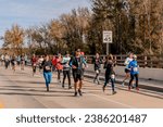 Small photo of Richmond, Virginia, USA - November 11th 2017: Jacquelyn Nance, Lizzabeth Brown, Roslyn Samuels, Alicia Laporta and a group of runners on the Huguenot Bridge during the Richmond Marathon