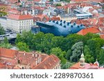 Small photo of Graz, Austria - May 28 2019: Aerial view of the Kunsthaus Graz, a riverside modern art museum in amorphous blue building, with cutting-edge, temporary exhibitions.