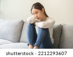 Small photo of Sad, unhappy. Alone asian young woman, girl expression face thinking about problem, difficulty, feeling failure and exhausted, suffering from loneliness, grief sorrow and bad relationship or break up.