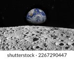 Planet Earth as seen from surface of The Moon.  Elements of this image furnished by NASA.
