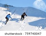 snowy hill and climbing teenagers