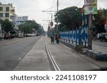 Small photo of Kolkata, West Bengal, India, Sep 24 2022: A scene of street and scant traffic on tram route seen from inside a car.
